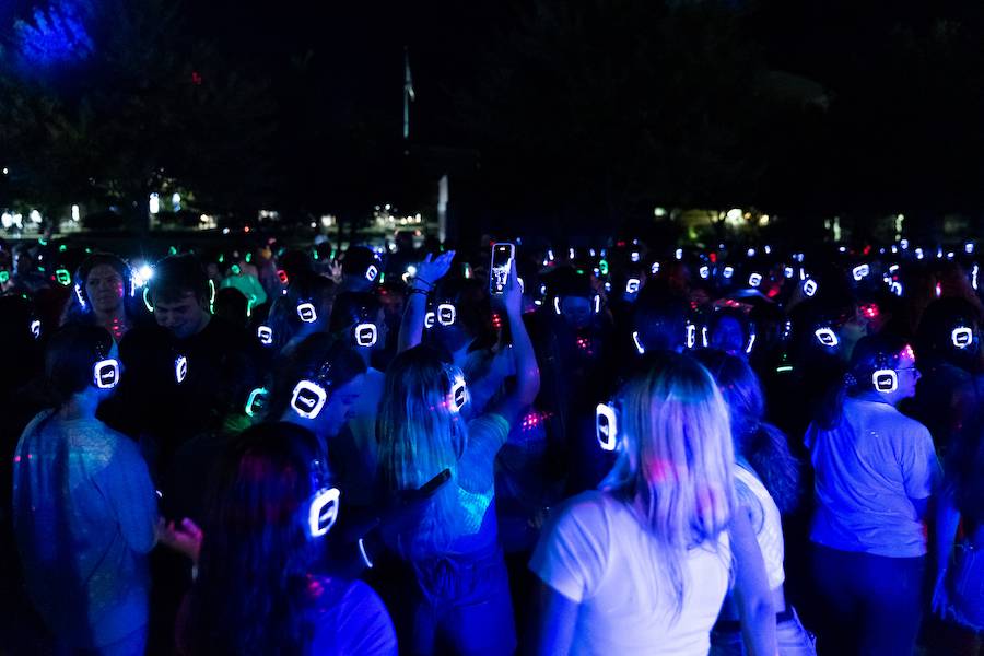 A group of students dancing and having fun at the Silent Disco